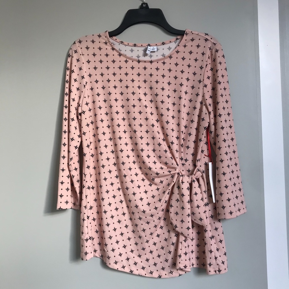 Pretty pink top w/ waist-flattering tie above hip!